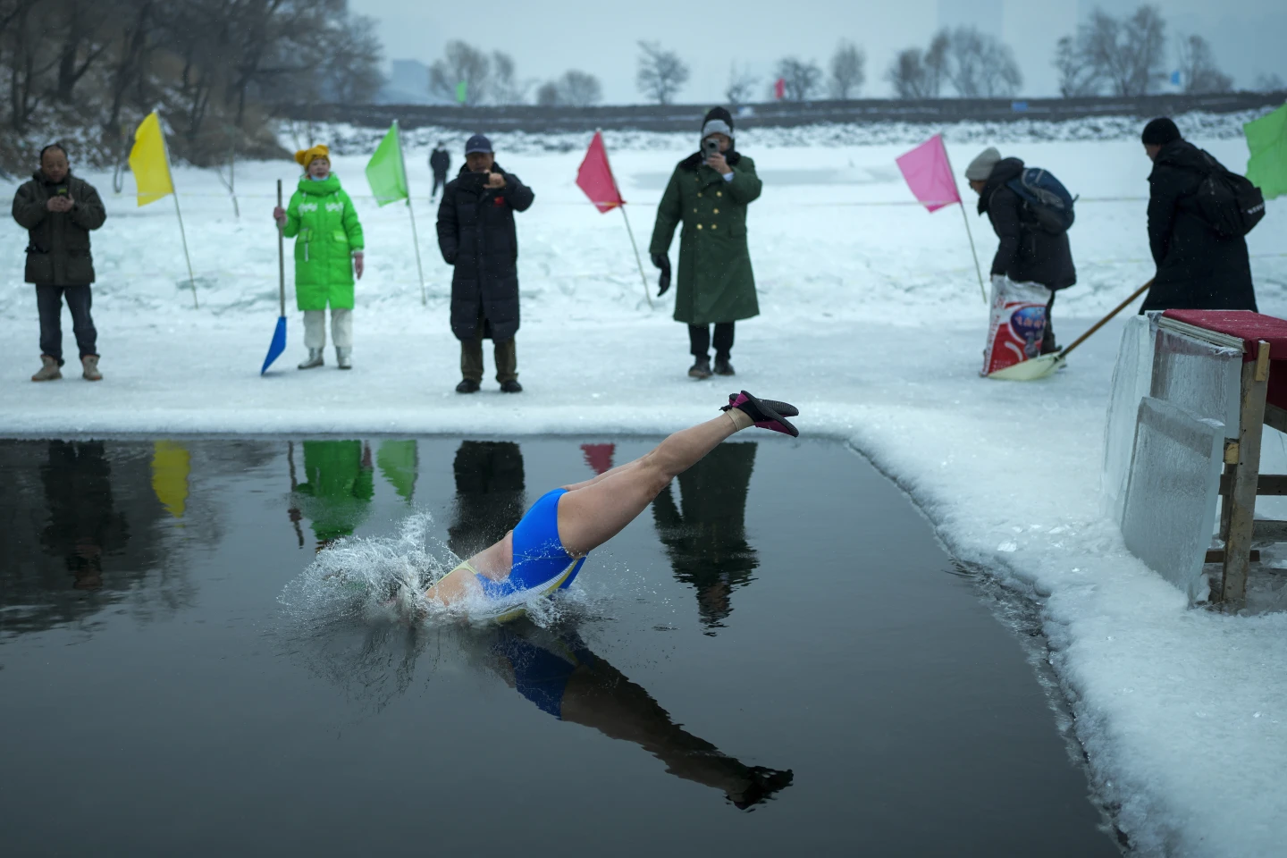 Harbin's Winter Swimmers Brave Icy Waters, Embrace Tradition and Health Benefits